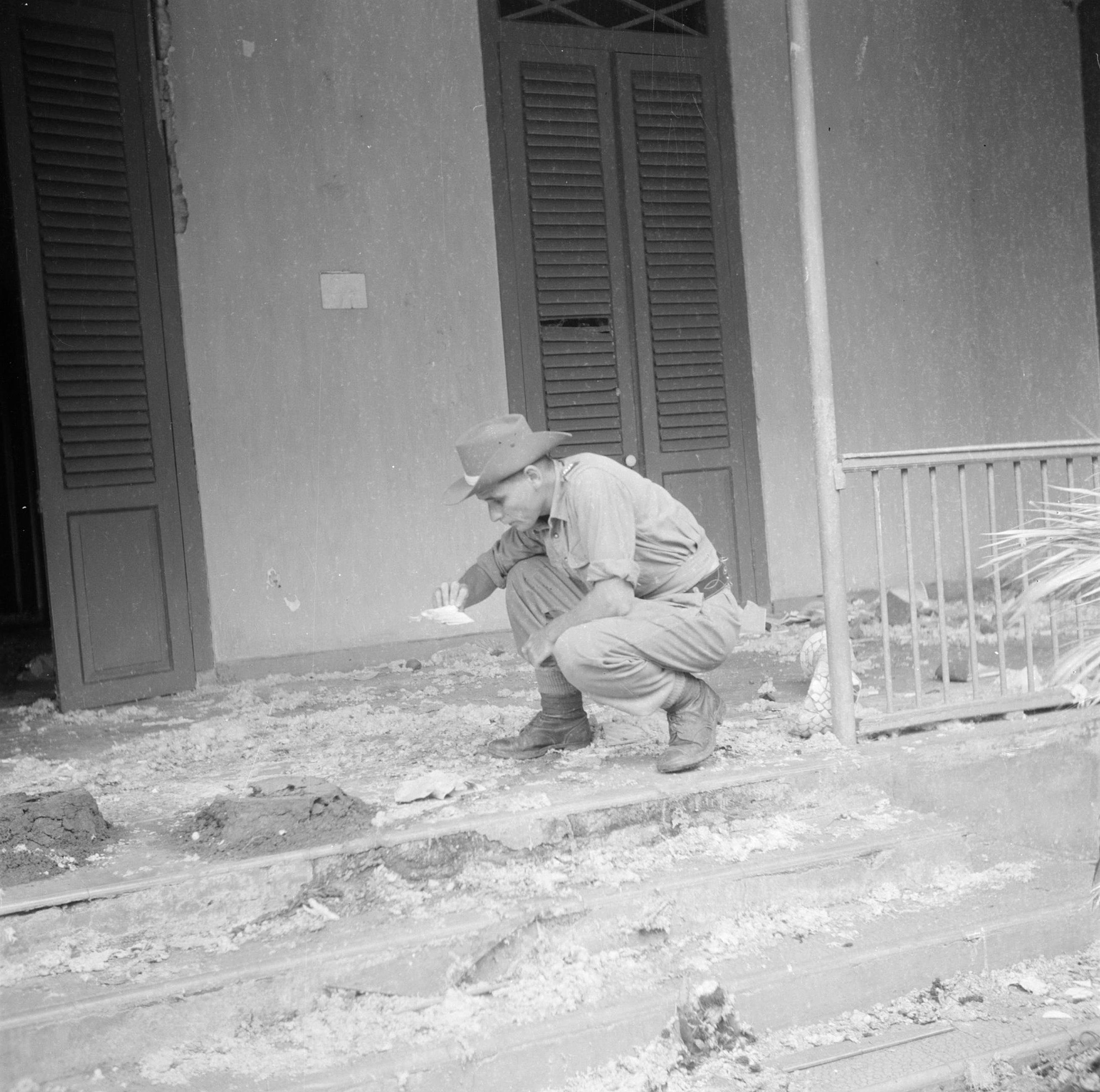 Husband in the rubble